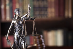 statue of justice which symbolizes the fairness of auctions throughout the history of auctions